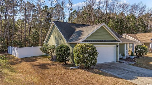 view of side of property featuring a garage