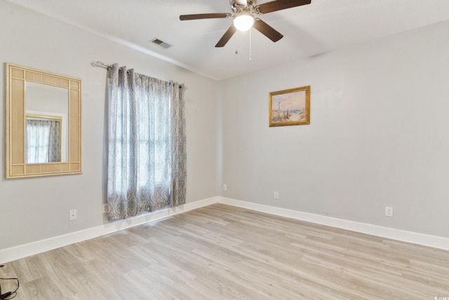 unfurnished room featuring light hardwood / wood-style flooring and ceiling fan