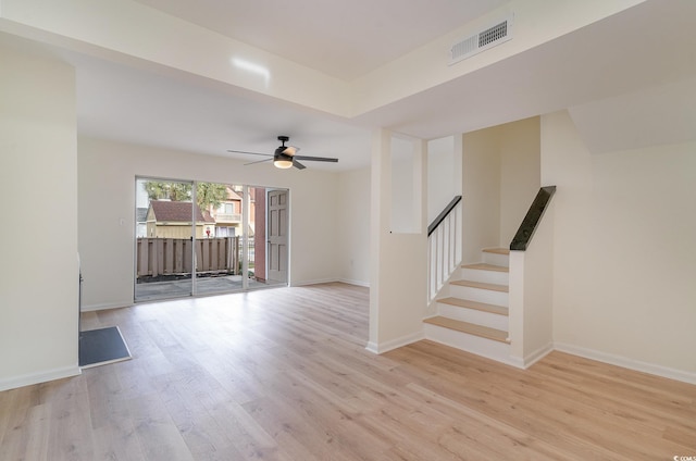 spare room with light hardwood / wood-style floors and ceiling fan