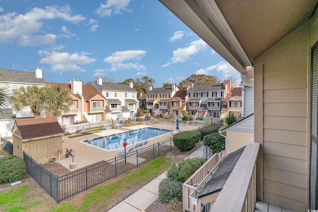 view of swimming pool with a patio area