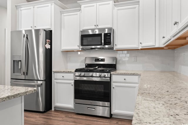 kitchen featuring white cabinetry and appliances with stainless steel finishes