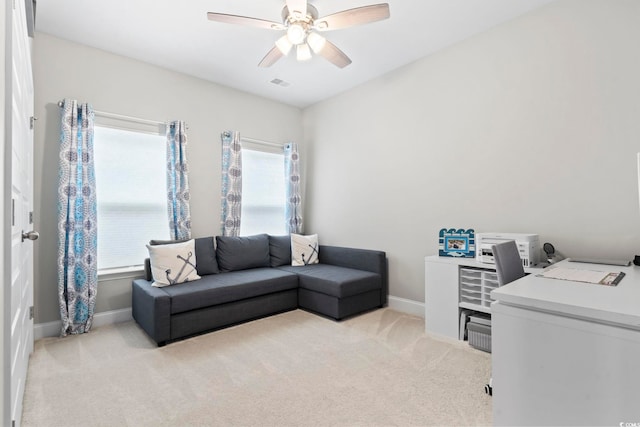 interior space featuring ceiling fan