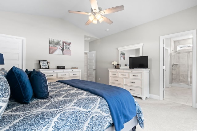 carpeted bedroom featuring connected bathroom, ceiling fan, and vaulted ceiling