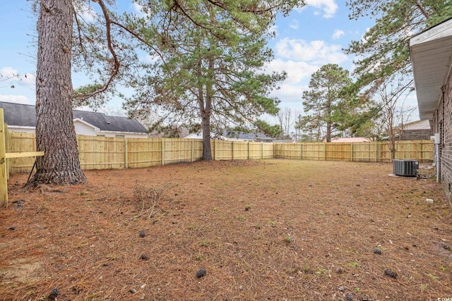 view of yard with central AC