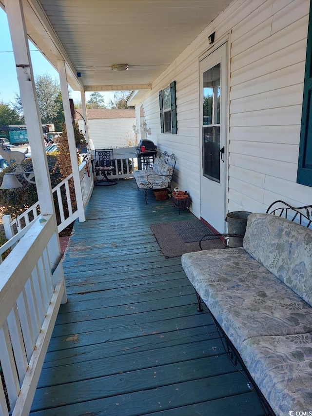 wooden terrace with covered porch