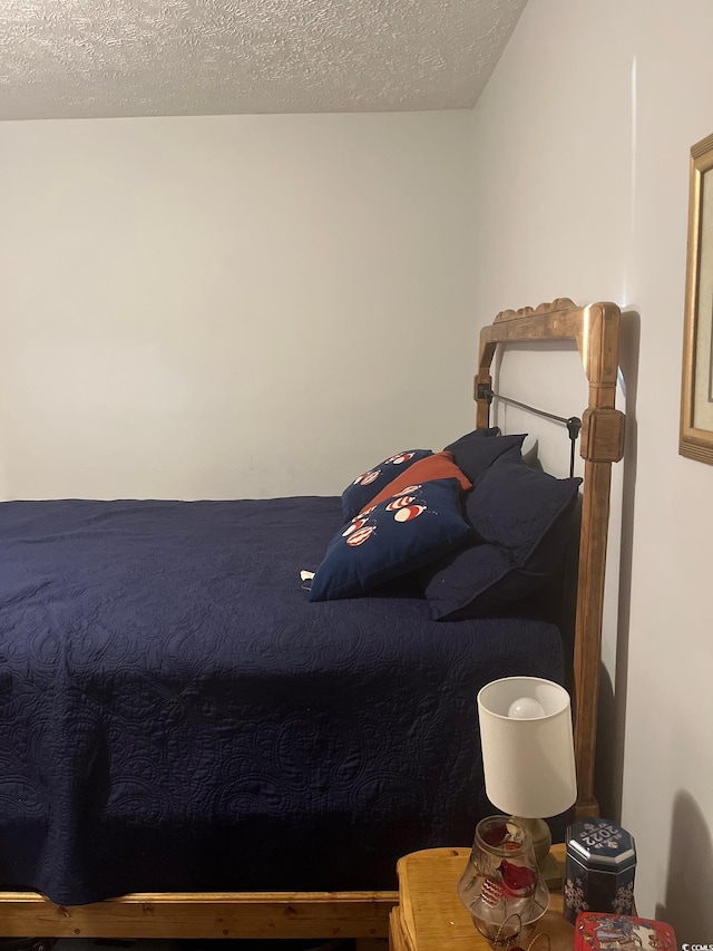 bedroom with a textured ceiling