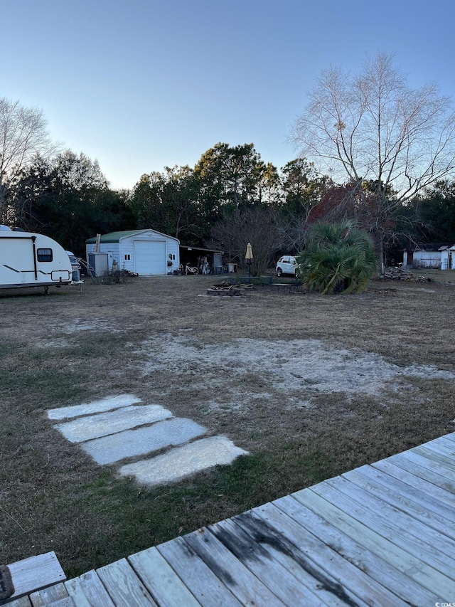 view of yard with a garage