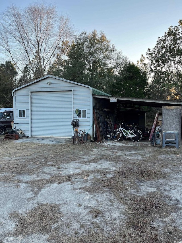 garage with a carport