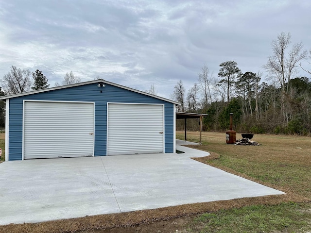 garage with a yard