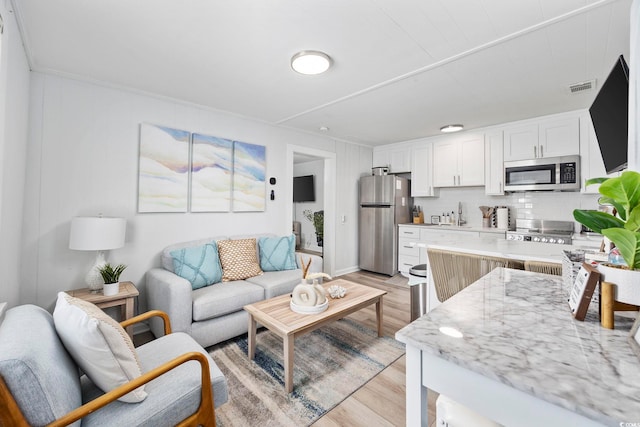 living room featuring light hardwood / wood-style flooring