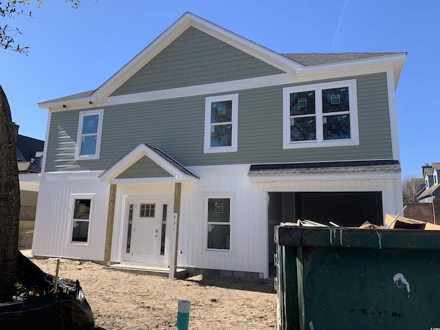 view of front of property featuring a garage