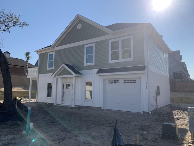 view of front of house featuring an attached garage and board and batten siding