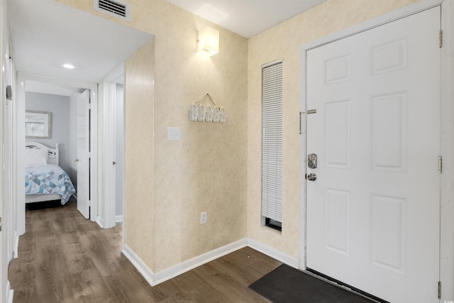 foyer with hardwood / wood-style floors