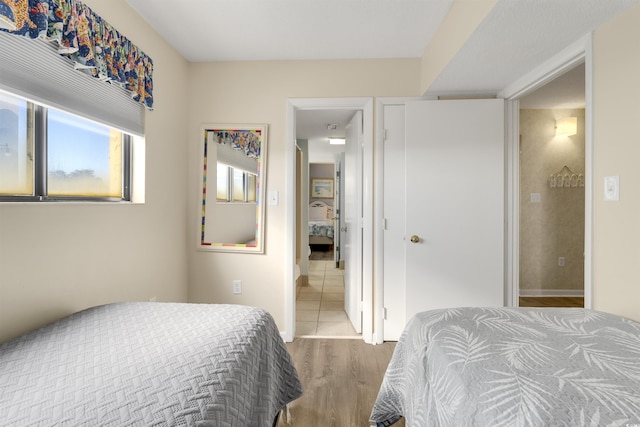 bedroom with wood-type flooring