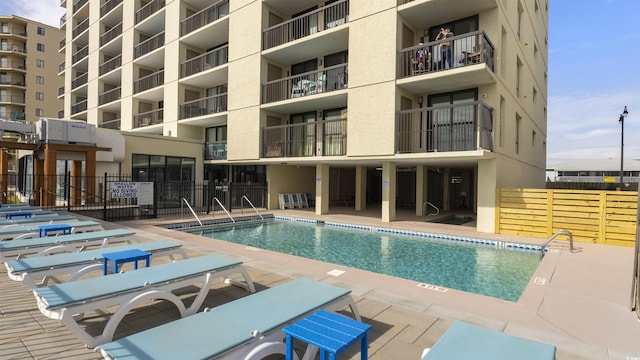 view of pool featuring a patio area