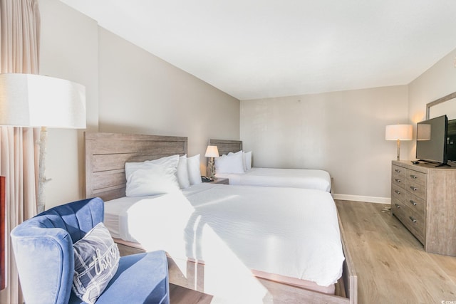 bedroom featuring light hardwood / wood-style floors