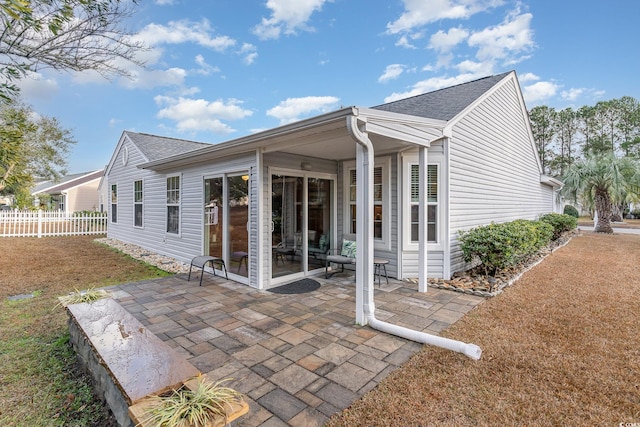 rear view of house featuring a patio area