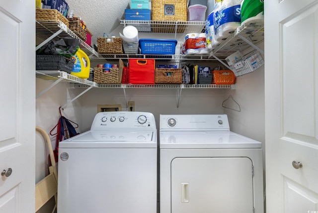 washroom featuring independent washer and dryer