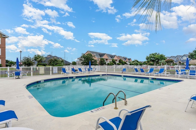 view of pool featuring a patio