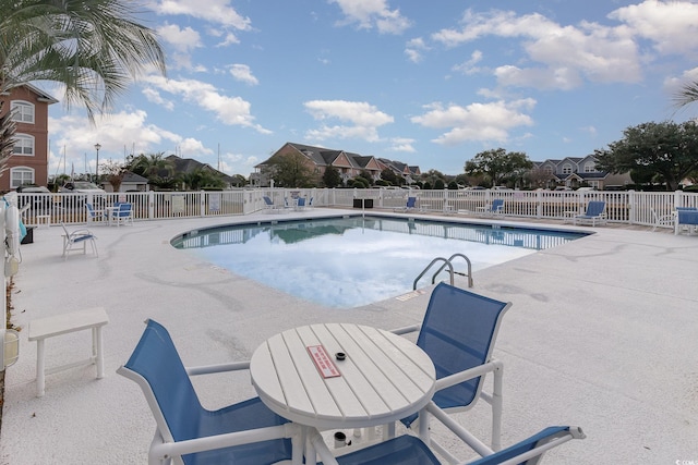 view of pool with a patio