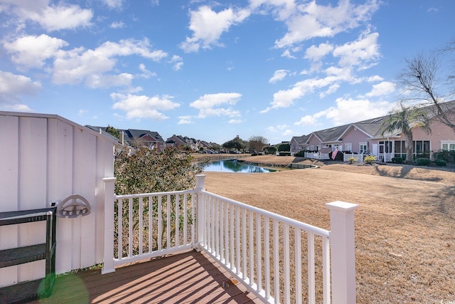 deck featuring a water view