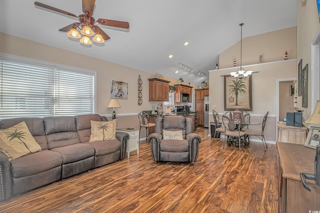 6001-1909 S Kings Hwy, Myrtle Beach, SC 29575 - living room featuring ceiling fan with notable chandelier, lofted ceiling, and wood finished floors