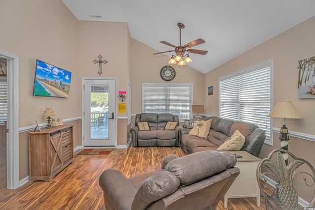 6001-1909 S Kings Hwy, Myrtle Beach, SC 29575 - living room featuring visible vents, baseboards, ceiling fan, and light wood finished floors