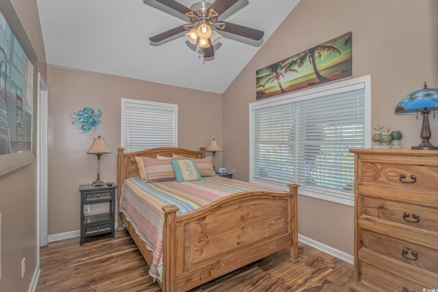 6001-1909 S Kings Hwy, Myrtle Beach, SC 29575 - bedroom featuring lofted ceiling, wood finished floors, and baseboards