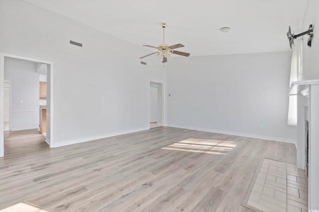 703 Gleneagles Dr, Myrtle Beach, SC 29588 - unfurnished living room with ceiling fan, high vaulted ceiling, and light hardwood / wood-style floors