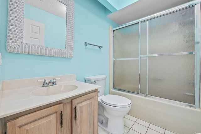 703 Gleneagles Dr, Myrtle Beach, SC 29588 - full bathroom featuring tile patterned floors, toilet, vanity, and combined bath / shower with glass door