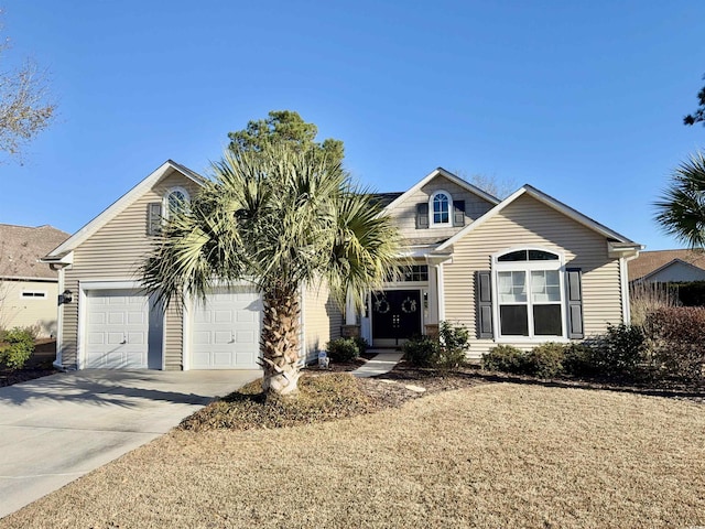 view of front of property featuring a garage