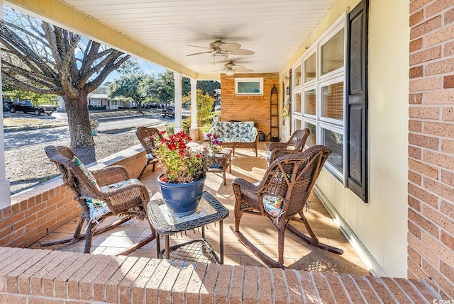 view of patio featuring a porch and ceiling fan