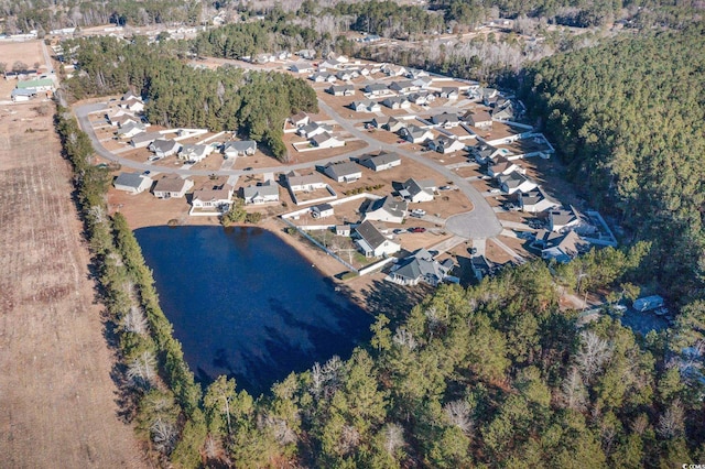 birds eye view of property with a residential view and a water view