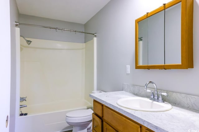 full bathroom with vanity, shower / washtub combination, and toilet