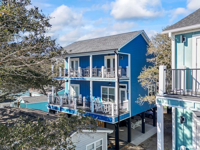 rear view of house with a balcony