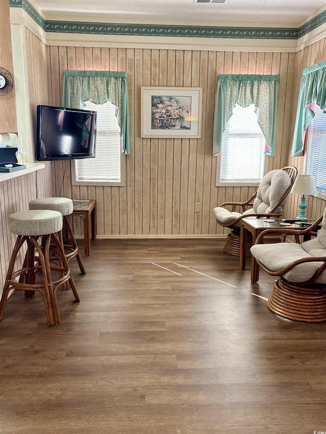 sitting room featuring hardwood / wood-style flooring