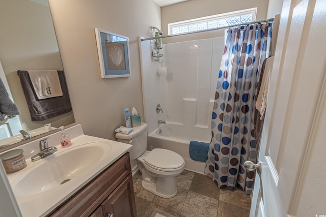 full bathroom with vanity, toilet, and shower / bath combo with shower curtain