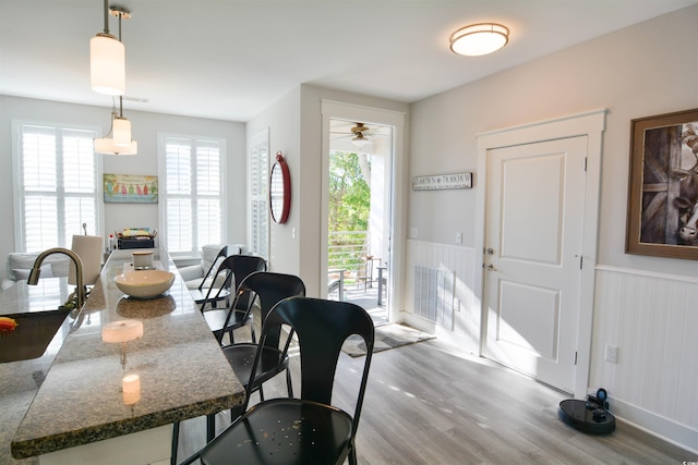 dining area featuring light wood-type flooring