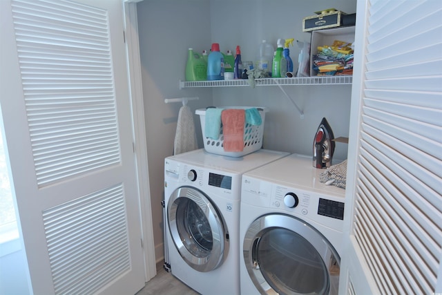 washroom featuring separate washer and dryer