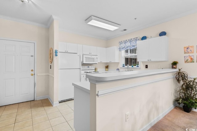 kitchen with white appliances, white cabinets, sink, crown molding, and kitchen peninsula