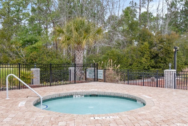 view of pool featuring a community hot tub