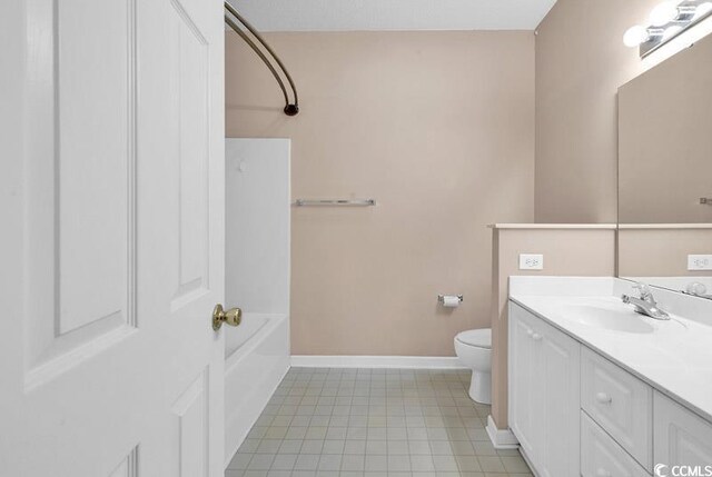 4672 Lightkeepers Way Unit 50-E, Little River, SC 29566 - bathroom with toilet, vanity,  shower combination, tile patterned flooring, and baseboards