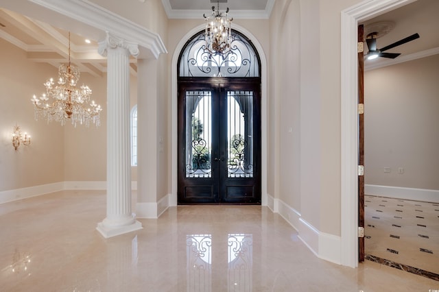 entryway featuring french doors, crown molding, coffered ceiling, and decorative columns