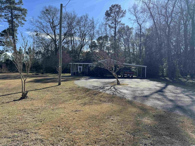 exterior space with a carport