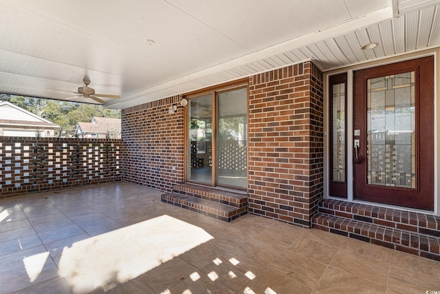 view of patio featuring ceiling fan and covered porch