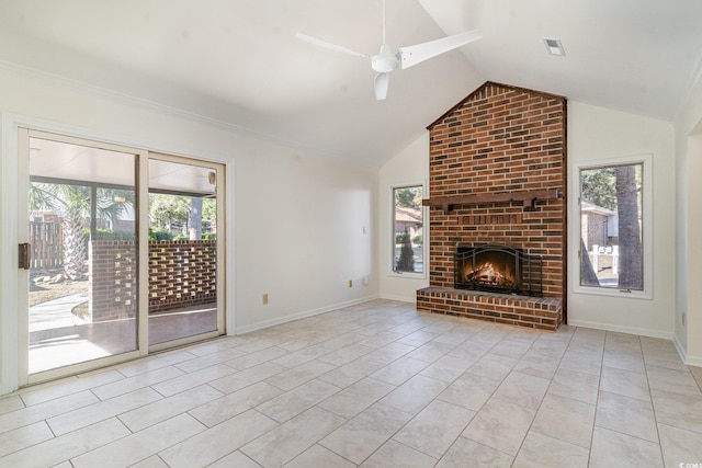 unfurnished living room with ceiling fan, light tile patterned floors, vaulted ceiling, and a brick fireplace