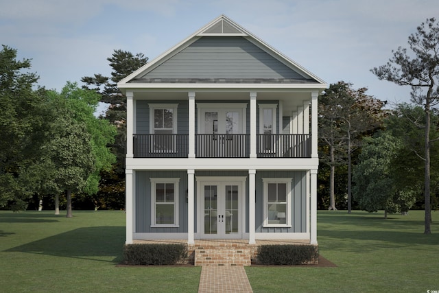 view of front of property with board and batten siding, french doors, and a front lawn