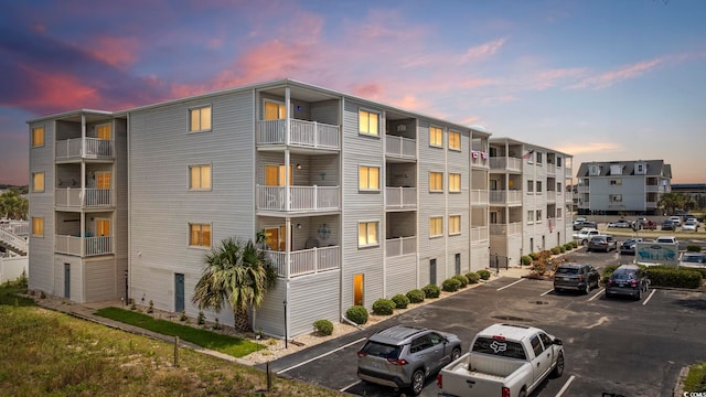 view of outdoor building at dusk