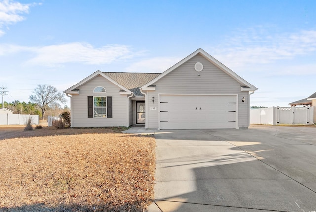 ranch-style home featuring a garage