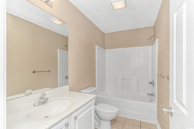 full bath featuring toilet, a textured ceiling, vanity, shower / bath combination, and tile patterned flooring